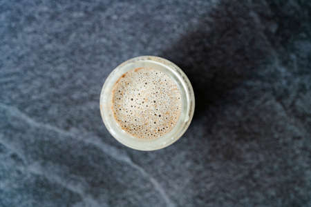 Take Away Homemade Almond Milk in Bottle with Vanilla Extract and Cinnamon Powder. Take Out. Ready to Drink.の写真素材