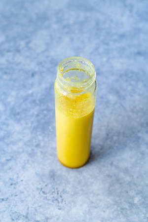 Take Away Ayurvedic Drink Golden Milk in Bootle with Turmeric Ready to Drink.の写真素材