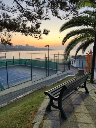 Iron Bench with seaside view.の写真素材