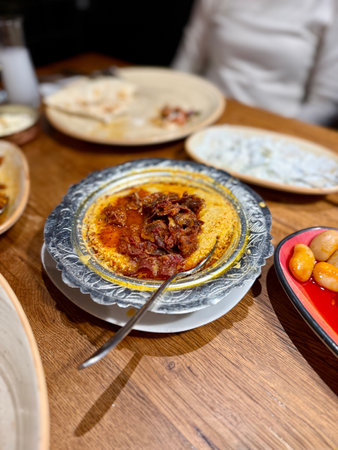 Delicious hummus with chickpeas, olive oil, lemon and pita bread. Vegetarian food conceptの写真素材
