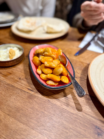 aditional delicious Turkish food Kidney beans with olive oil, Red kidney bean stew, Turkish name Red kidney bean stew served at restaurantの写真素材