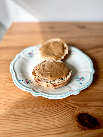 Peanut butter with cacao nibs spread on bread.の写真素材