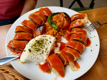 Turkish Beyti Kebap or kebab with yogurt, yoghurt served at local restaurantの写真素材