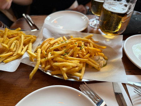 Potatoes with beer and chips served at pub restaurant ready to eat