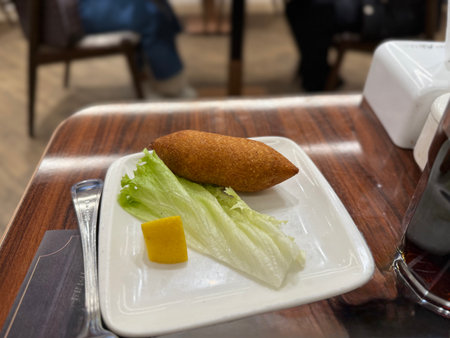 Delicious Lebanese (Arabic) food, kibbeh (kibe), stuffed meatballs. Served at restaurant
