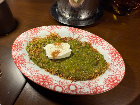 Turkish pistachio dessert baklava or kadayif served at restaurantの写真素材