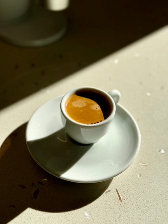 Espresso homemade Hot single shot in the morning dramatic lighting on marble surface