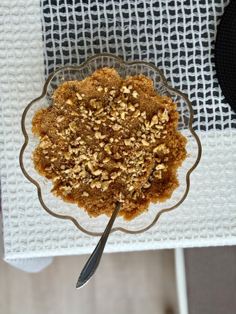 Homemade Traditional semolina sweet dessert halva (Turkish name semolina helvasi) served at home