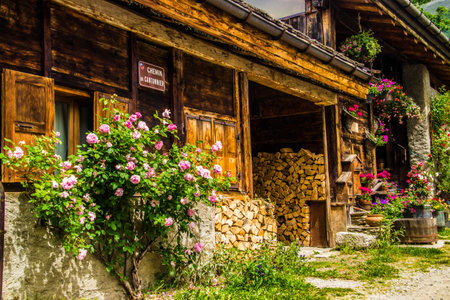 Wooden house with flowers in the village of Chamonix, Franceの写真素材