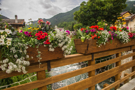Wooden balcony with flowers in the villageの写真素材