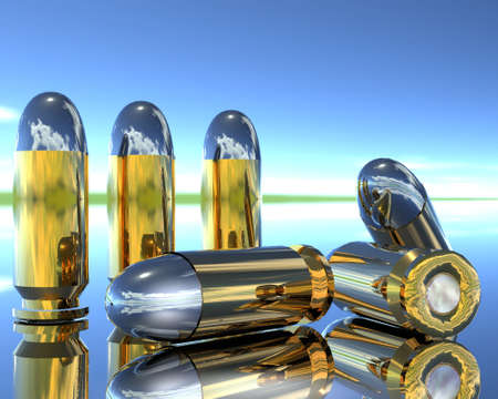 bright 3D golden and silver bullets on blueの写真素材