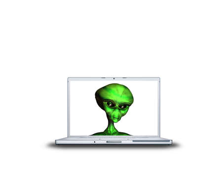 alien head on laptop screen isolated on white backの写真素材