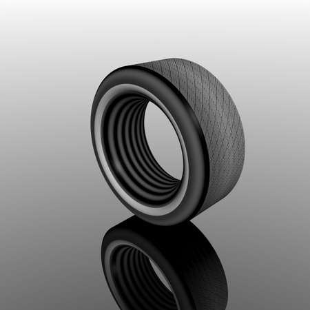tire wheel on a grey background with reflectionの写真素材