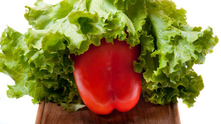 red spice on a wooden cutting boardの写真素材