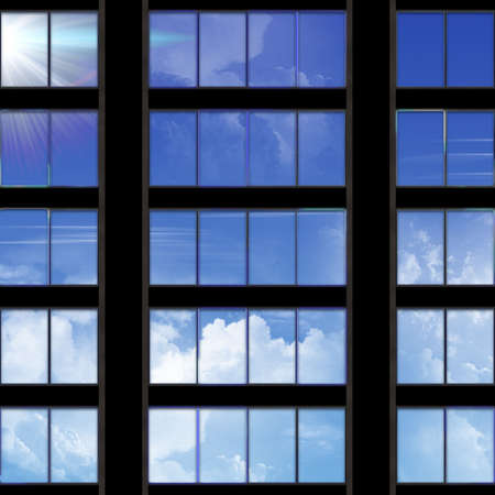 clouds and blue sky in a windowの写真素材