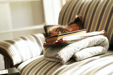 My aunts winter reading gear on the sofa.