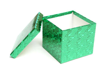 An empty green gift box over a white background.の写真素材