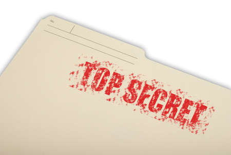 A top secret folder isolated on a white background.の写真素材