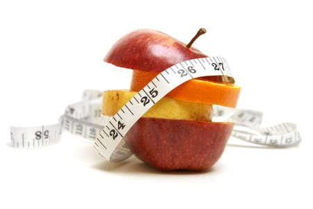 A conceptual fruit of fitness with various fruits and a measuring tape.の写真素材