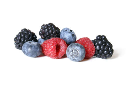 A cluster of mixed berries isolated on white.