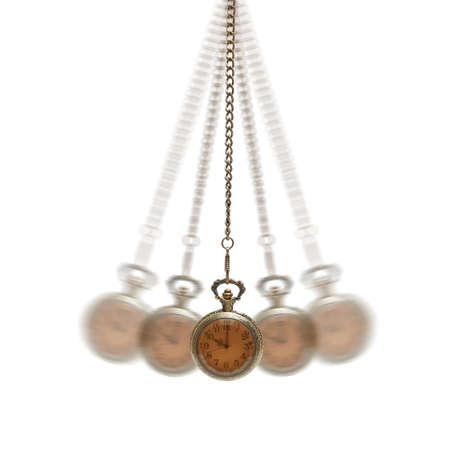 A pocket watch is going through a hypnotizing motion.