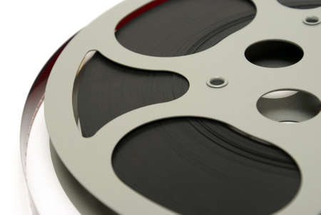 A closeup shot of a 16mm movie reel for projection playing at theaters.の写真素材
