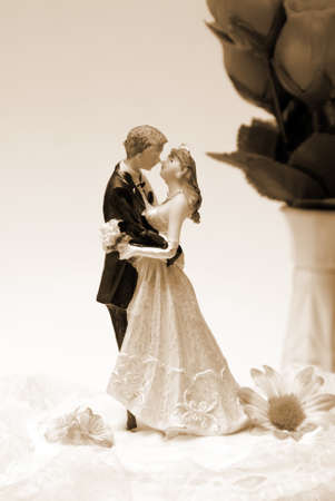 A wedding cake topper in a sepia toned image.の写真素材
