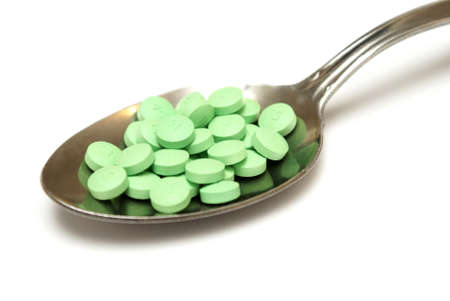 A spoonful of medical pills that could cause an overdose if taken at once.