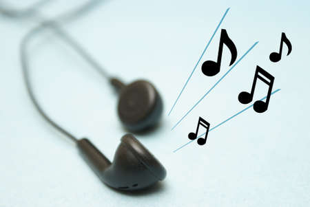 A set of headphones play some musical notes for the listener.