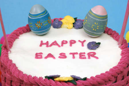 A closeup shot of an Easter cake decorated with eggs.