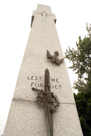 A world war memorial made of stone, stands proudly in the park of Smiths Falls, Ontario.のeditorial素材