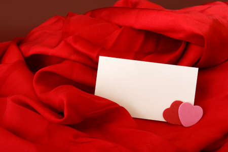 A blank notecard placed within a romantic scene.の写真素材