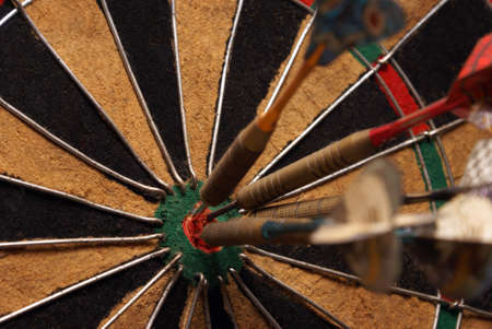 A macro shot of an old style dart board.