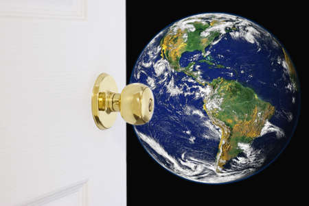 A door opening up to the world. Image credit of globe courtesy of NASA by public domain.の写真素材