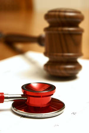 Medical and legal systems come together in this still life.の写真素材