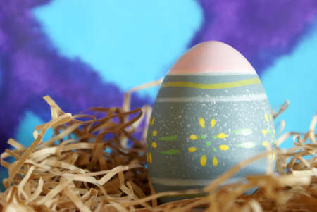 A lovely painted Easter egg sits in the paper shed for the holiday season.