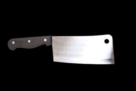 An isolated image of a butcher knife over a black background.