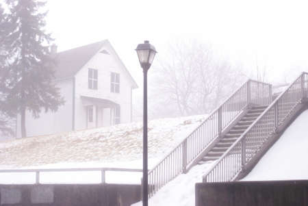 One frame of a series of images produced to emphasize the emotional and dramatic effects of the mist setting on the river bed in a local town during the seasonal changes into the early springtime.のeditorial素材