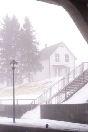 One frame of a series of images produced to emphasize the emotional and dramatic effects of the mist setting on the river bed in a local town during the seasonal changes into the early springtime.のeditorial素材