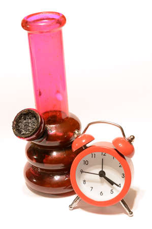 A bong and a clock to represent 4:20 themes.