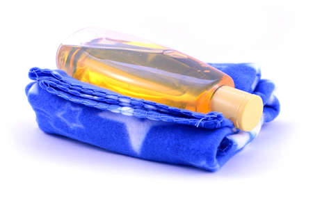 Closeup of an isolated baby blanket and liquid soap for bathing.の写真素材