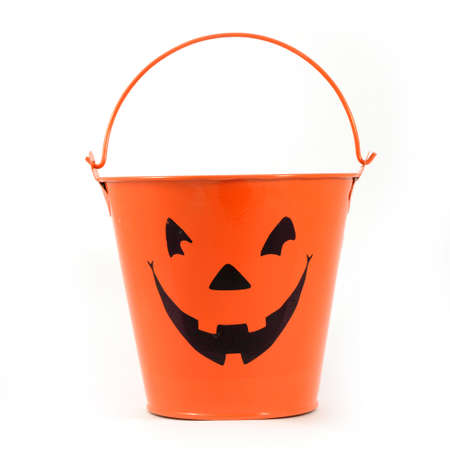 A festive bucket to hold candy for the Halloween trick or treats.の写真素材