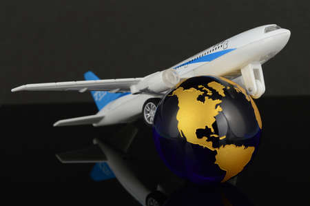 A conceptual image of an airplane traveling the whole world.の写真素材