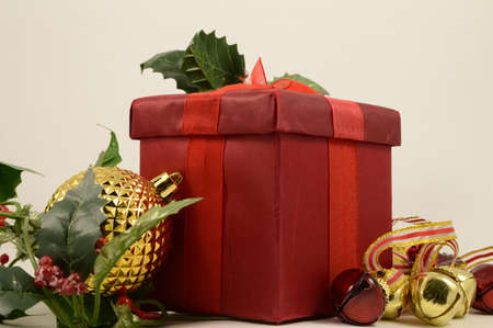 A red gift box to be given during the holiday season festivities.の写真素材