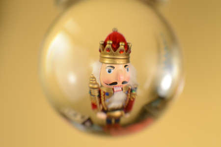 A festive nutcracker is viewed inside a crystal ball during the Christmas holidays.