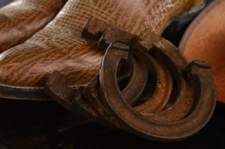 Closeup image of a full set of retro horse shoes for a small colt or a pony.の写真素材