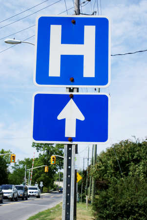 A Canadian hospital direction street sign used in traffic law and order.の写真素材
