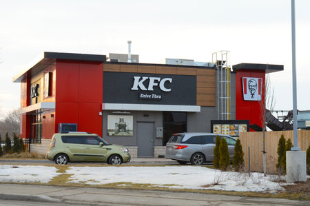 SMITHS FALLS, ONTARIO, CANADA, MARCH 10, 2021: View of the newly built KFC drive thru location in small town Smiths Falls, ON.のeditorial素材