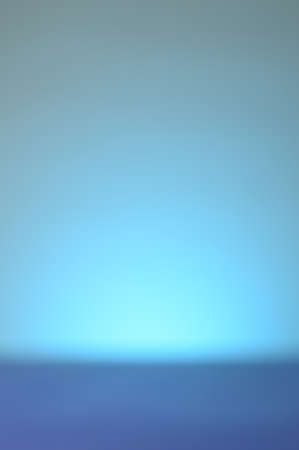 An abstract blue blurred background for use in design work or page layouts.