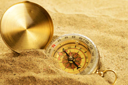 A lost compass buried into the sands below makes it hard to find your bearings.の写真素材